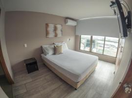 Santorini Apartamentos Amoblados，位于佩雷拉的酒店