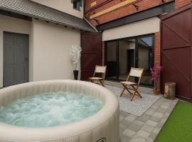 Loft cosy jaccuzi & terrasse，位于格里希的酒店