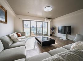 LIT広島駅前 広島駅から徒歩5分 全室リバービューでベッドはairweaveを採用 Spacious rooms with river views all to yourself Supported，位于Ōsukachō的酒店