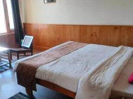 Santoshi Cafe & Rooms