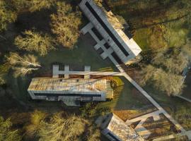 Lodge met Jacuzzi - 6 personen - Woodz Lodges，位于赫斯登-佐尔德尔的酒店