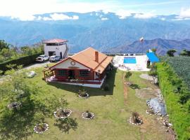 Cabaña Villa Claudia，位于洛斯桑托斯的酒店
