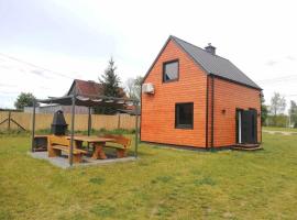Domek przy plaży na mazurach，位于奥日什的酒店