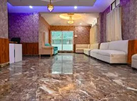 Holiday Inn Guest House Near Nemcare Hospital