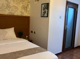 whispering palms gardens hotel and suites，位于内罗毕的酒店