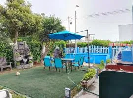 Casa de playa con piscina y parrilla