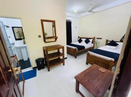 Natraj Guest House，位于亭可马里的酒店