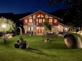 Vivienda turistica jardín con encanto y piscina