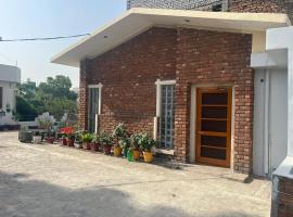 Green Backpacker's Hostel and Homestay，位于阿姆利则的酒店