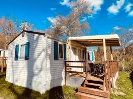 Mobil-home 3ch le Per Malou Camping Les Clarines，位于拉布尔布勒的酒店