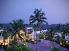 喀拉拉邦泰贝卡Spa度假村，位于贝格尔的带停车场的酒店
