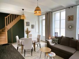 Maison 2 chambres avec parking et jardin，位于努瓦永的酒店