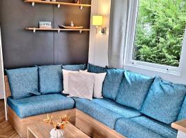 EnJoy Natur, See und Meer Chalet Lauwersoog- 1-6 Pers- 3 Schlafzimmer, 2 Badezimmer- Frühes Einchecken ab 14 Uhr，位于劳雷尔苏格的酒店