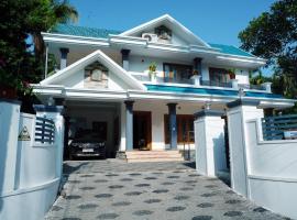 Sree Nandhavanam Homestay，位于古鲁瓦尤尔的酒店