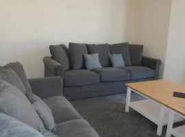 The Newborough sleeps 8 Apartments