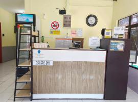 OYO 91139 Selesa Inn，位于Kampong Tanjong Putat的酒店