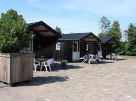 Kampeerhut met gedeeld sanitair