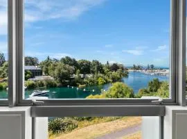Luxury Riverfront Apartment With Views and Pool Access