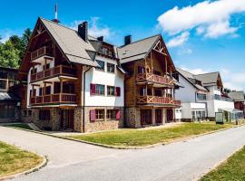 Pohorje Village Wellbeing Resort - Family Apartments Bolfenk，位于霍茨科波霍尔耶的酒店