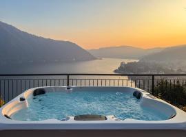 Villa amazing lake view with jacuzzi, private garden and gym，位于切尔诺比奥的酒店