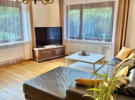 Ferienwohnung im Erdgeschoss mit eingezäunten Garten und Terrasse