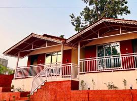 Brahmand cottages，位于达博利的酒店