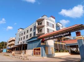Hotel Partha International，位于Koppal的酒店