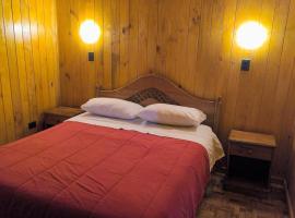 AMAVAL Cabaña nueva hasta 7 personas full equipada 2 habitaciones calefacción a leña，位于Carahue的酒店