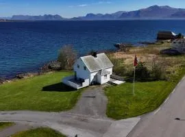 Sjønært feriehus, båt tilgjengelig for leie