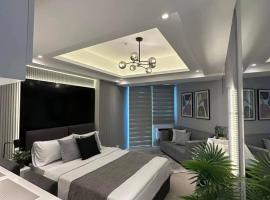 Stylish Stay at Azure North near Malls and Tourist Destinations，位于圣费尔南多的公寓式酒店