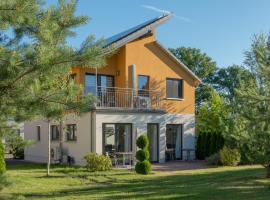 Ferienpark Rübezahl am Müggelsee, Haus 13 Erle mit eigener Sauna, idealer Ort für Natur- und Erholungssuchende, für Radfahrer, Familien mit Kindern und Hundeliebhaber，位于柏林的酒店
