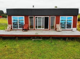 Cabañas Chiloé Quemchi Laguna Popétan，位于Chohen的酒店
