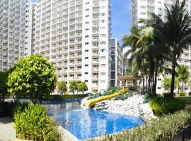 La Vie Riche Holiday Homes - Cozy 1BR Apartment near MOA，位于马尼拉的公寓式酒店