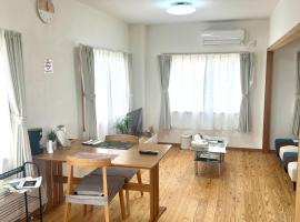 オレンジコーポ 202号室，位于荒尾的酒店