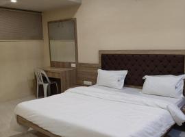 sunshine lodge，位于Baramati的酒店