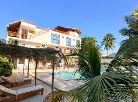 Mexhe Hotel El Cuyo，位于埃尔库约的海滩酒店