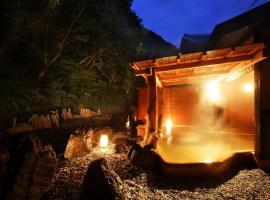 Hotel Kunitomi Suisennkaku，位于系鱼川市的酒店