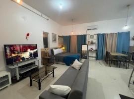 Deluxe studio unit at Modena Town Sq，位于Tunghaan的酒店
