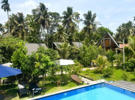 Steps Garden Resort，位于尼甘布的酒店