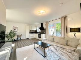 LIVA Stays - Henstedt Ulzburg - Nähe Hamburg & Flughafen - Nähe Bahnhof - Terrasse - Smart-TV，位于亨施泰特-乌尔茨堡的酒店