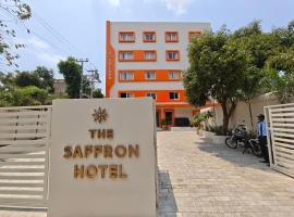 The Saffron，位于布巴内什瓦尔Biju Patnaik International Airport - BBI附近的酒店