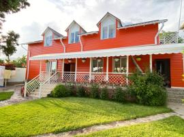 Osobyi Guest house，位于乔尔蓬阿塔的带停车场的酒店