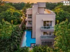 StayVista's Rosso with Outdoor Pool, Theatre-Disc Room & Games Room