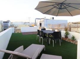 Charming Townhouse - Steps from Waterfront，位于马尔萨什洛克的酒店