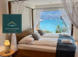Chalet Swiss Dream - Luxury Lakeview Chalet with AC near Interlaken，位于Niederried的酒店