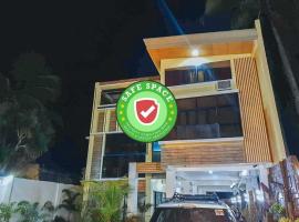 RedDoorz near SGM Condotel Villa Beach Iloilo，位于Molo的酒店