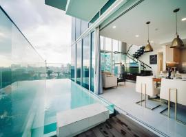 Serenity Saigon Sky Villas - Free One Way Airport Shuttle，位于胡志明市的酒店