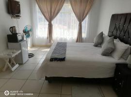 Oasis Paradise Guest House，位于梅富根的酒店