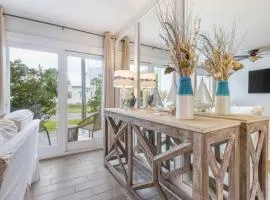Coastal-Chic Condo Steps from the Sand
