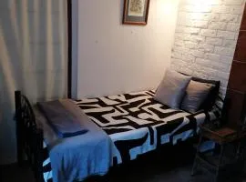 Ground Floor apartment-2 x single beds, TV,kitchen, own bathroom, patio